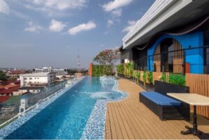 A rooftop pool and deck at COSI Vientiane Nam Phu are perfect for guilt-free lazy moments.