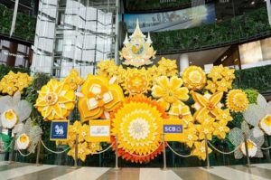 Exquisite floral installation art showcasing the "Yellow Star" or royal flower by Sakul Intakul.
